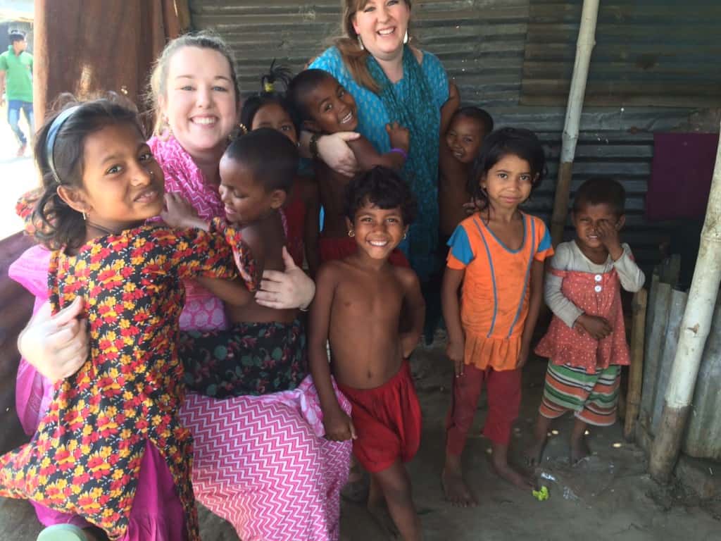 Visiting with children in a Dhaka slum.